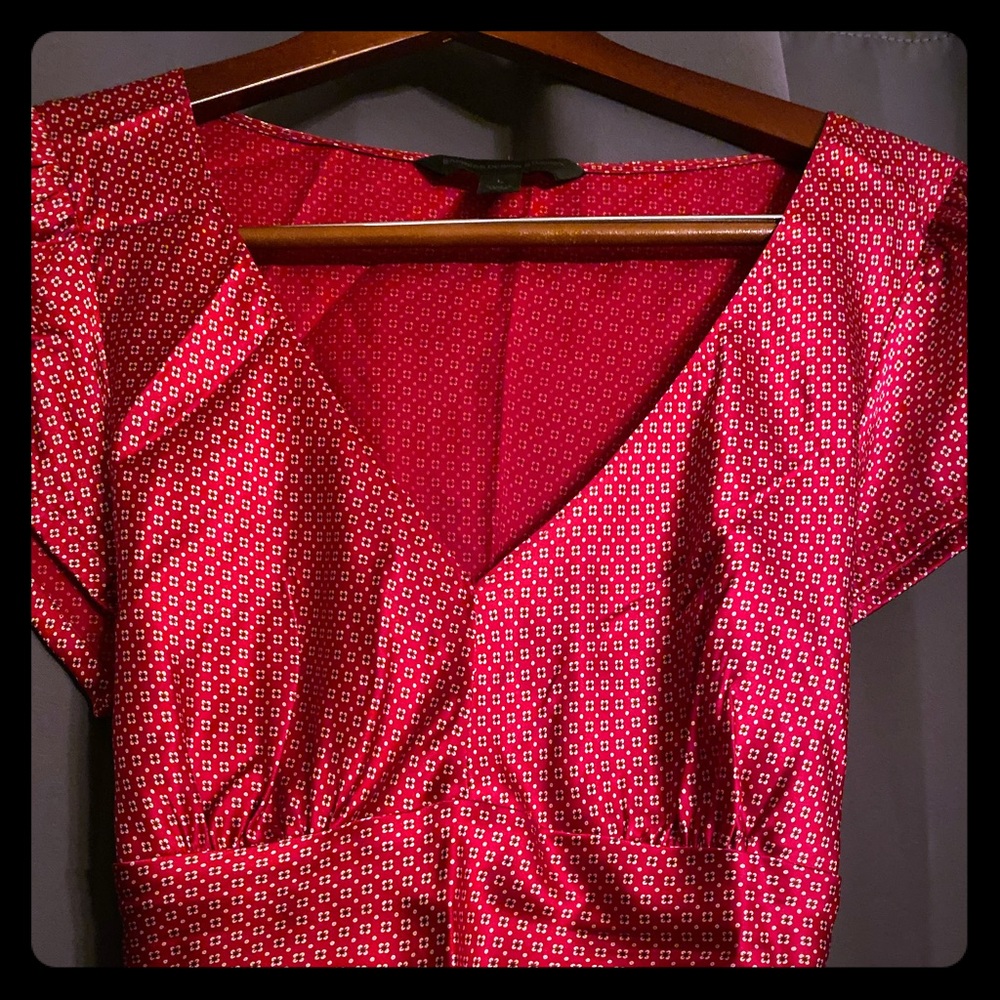 Red Express blouse with tie detail at waist